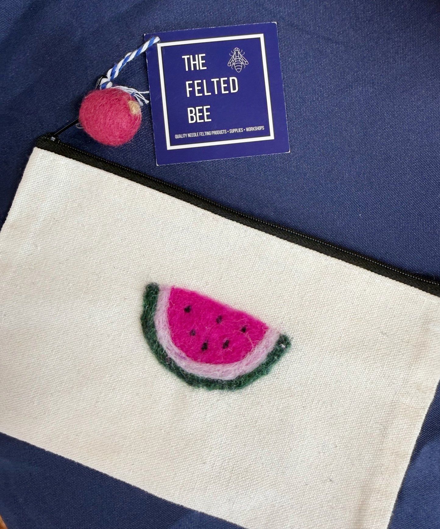 Learn to needle felt on a zippered pouch at Beautiful Horizon: Home, Garden & Gifts